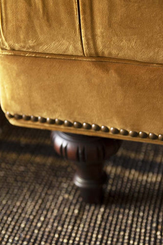 Detail image of legs & stud detail on the Ochre Gold Velvet Chesterfield Sofa