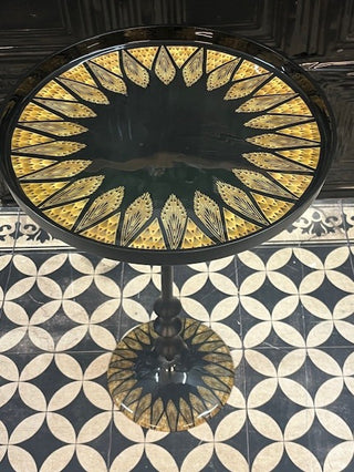  Image of the Black & Gold Art Deco Inspired Side Table on a geometric floor