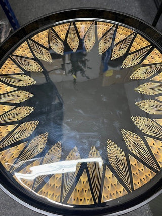 The surface of the Black & Gold Art Deco Inspired Side Table