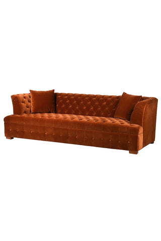 Cutout image of Burnt Orange Velvet Chesterfield Sofa on white background