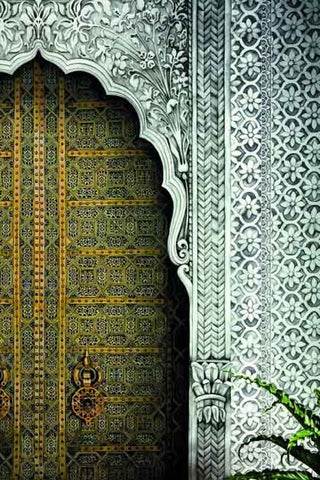 image of a wallpaper mural showing a Morroccan arch way and a decorative door. 