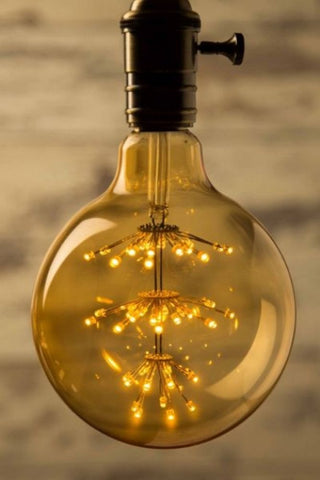 e27 3w giant star globe led bulb on neutral background lifestyle image