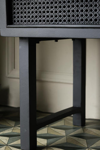 Image of the legs on the Black Cane Slim Bedside Table