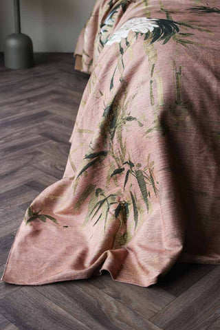 Image of the Cedomin Quilt Tapestry Throw In Rose draped