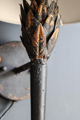 Close-up image of the finish on the Aged Effect Black & Old Gold Torch Wall Light