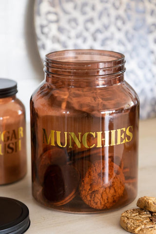 Lifestyle image of the Amber Glass Storage Jar With Black Lid - Munchies