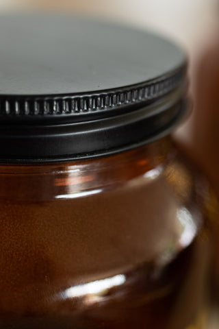 Image of the lid for the Amber Glass Storage Jar With Black Lid - Rocket Fuel
