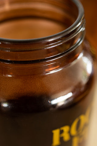 Image of the top of the Amber Glass Storage Jar With Black Lid - Rocket Fuel