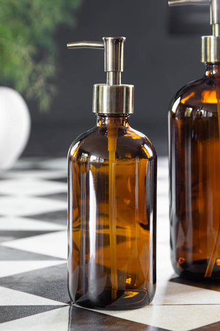 Image of the Small Amber Tinted Glass Soap Dispenser Bottle with the gold nozzle