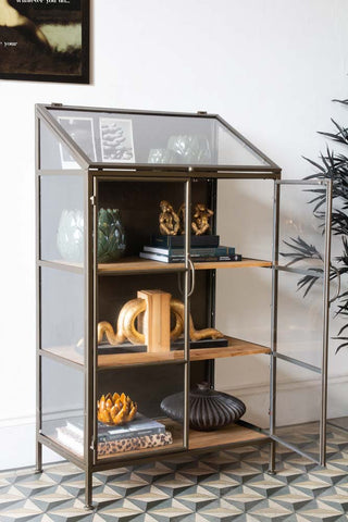 Lifestyle image of the Antique Brass Glass Display Cabinet with one door open