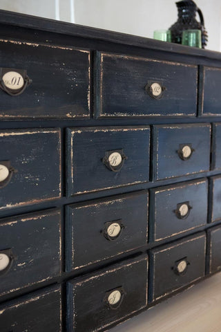 Close-up image of the drawers on the Antique Style Black Multi-Drawer Storage Cabinet