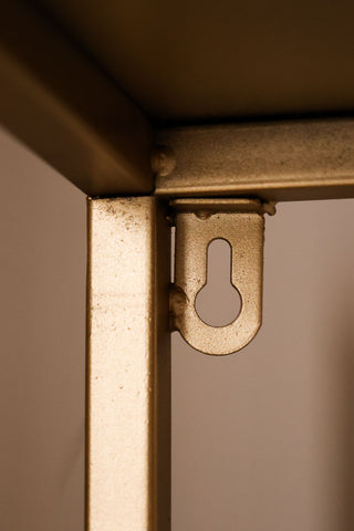Image of the fixing eye to secure the Antique Brass Slim 6-Tier Shelving Unit to the wall