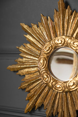 Close-up image of the Antique Gold Small Star Convex Mirror