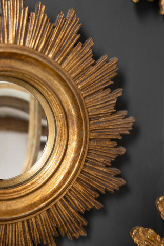 Close-up image of the Antique Gold Small Sun Convex Mirror