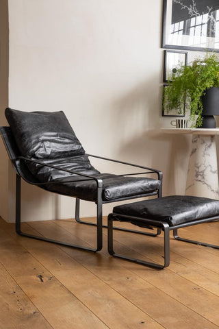 Lifestyle image of the Antique Slate Leather Lounger & Stool