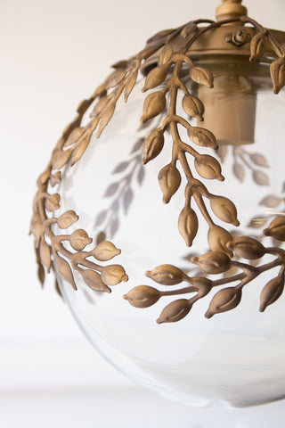 Close-up image of leaf detailing on the Ornate Globe Pendant Ceiling Light With Brass Leaf Detailing