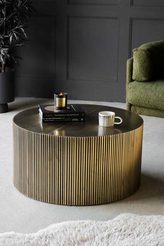Lifestyle image of the Antique Brass Round Coffee Table