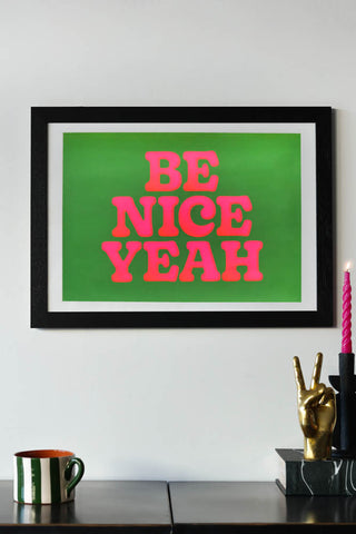 Lifestyle image of the Be Nice Yeah By Limbo & Ginger A2 Typographic Art Print With Black Wooden Frame