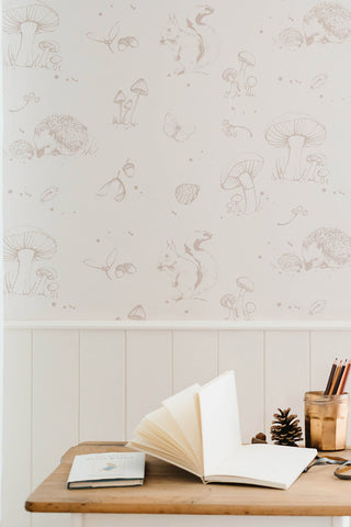 Lifestyle image of the Bear & Beau Woodland Wallpaper In Linen