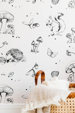 Lifestyle image of the Bear & Beau Woodland Wallpaper In Putty