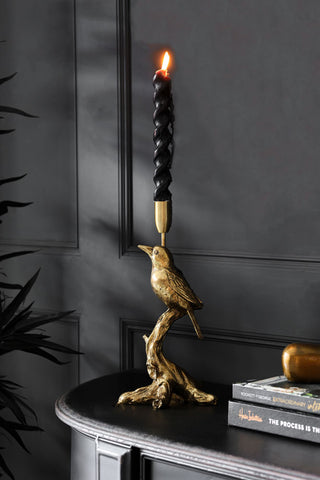 Lifestyle image of the Beautiful Bird Candle Holder