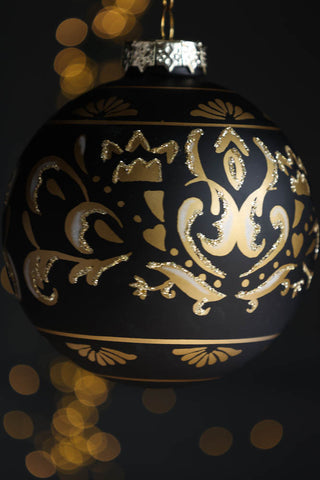 Close-up image of the Black & Gold Swirl Glass Bauble Christmas Tree Decoration