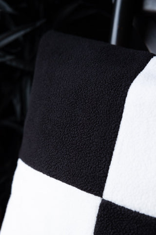 Close-up image of the Black & White Checkered Square Cushion