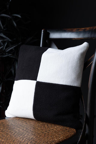 Lifestyle image of the Black & White Checkered Square Cushion