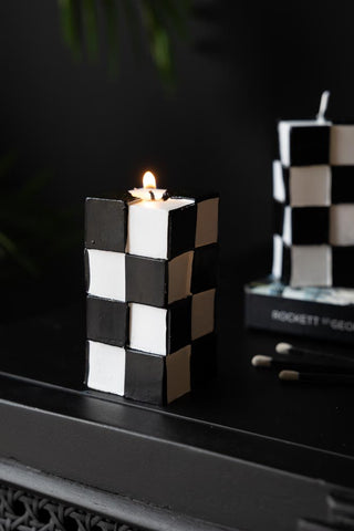 Lifestyle image of the Black & White Miniature Checkered Candle