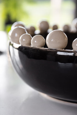 Close-up image of the Large Black & Cream Bobble Edged Bowl - Dia.37cm