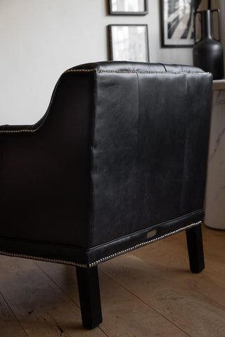 Image of the back of the Black Buttoned Back Leather Armchair