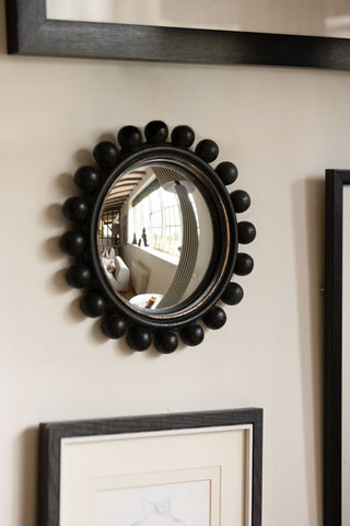 Lifestyle images of the Black Bobbin Convex Mirror