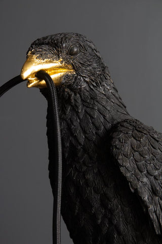 Close-up image of the head on the Black Crow Table Lamp