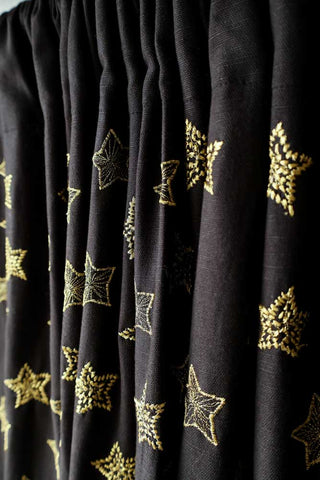 Image of the material for the Set of 2 Black Curtains with Gold Embroidered Stars