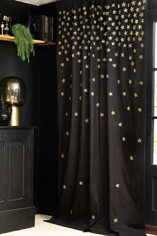 Lifestyle image of the Set of 2 Black Curtains with Gold Embroidered Stars