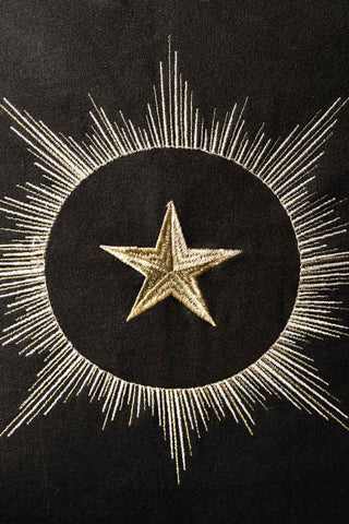 Close-up image of the Black Star Embroidered Cushion