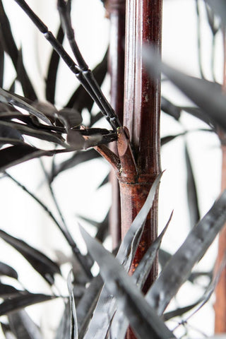 Close-up image of the stem of the Black Faux Bamboo Plant