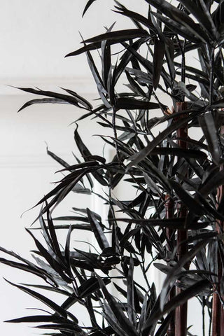 Close-up image of the Black Faux Bamboo Plant