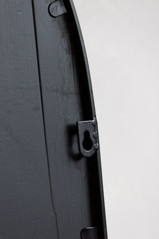 Detail image of the Black Metal Arch Window Pane Indoor/Outdoor Mirror With Opening Doors' fixings on the back