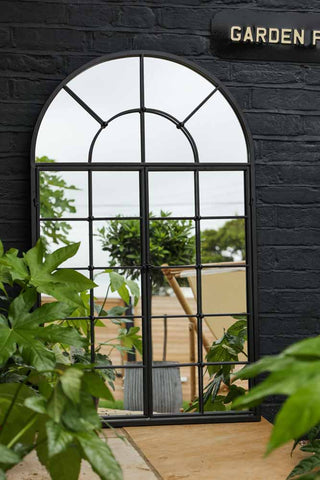 Image of the Black Metal Arch Window Pane Indoor/Outdoor Mirror With Opening Doors