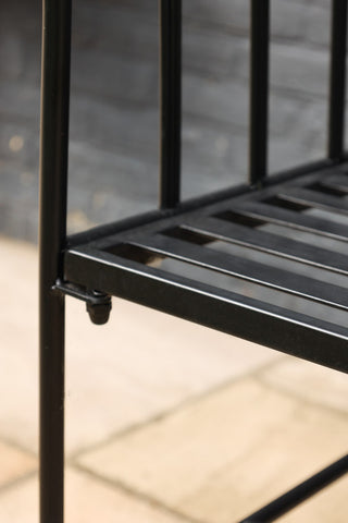 Close-up image of the seat of the Black Metal Garden Bench