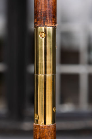 Image of the gold pole connection on the Black Square Printed Parasol