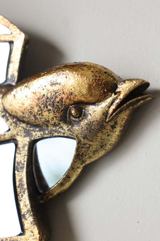 Close-up image of the head on the Brass & Mirror Swallow Wall Decoration