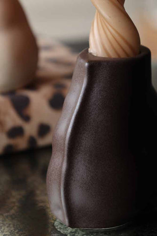 Image of the side of the Brown Bottom Candlestick Holder