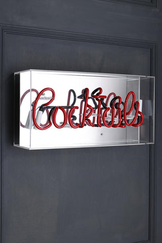 Image of the Cocktails Neon Light Box switched off on a wall