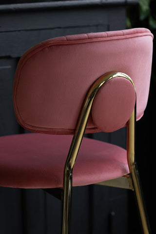 Detail image of the Coral Pink Velvet Bar Stool With Gold Legs