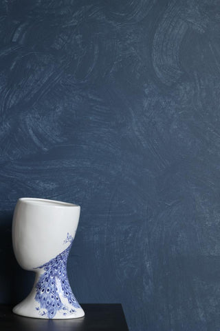 Image of the Craig & Rose Artisan Chalk Wash - Blue Ochre - 750ml with a vase