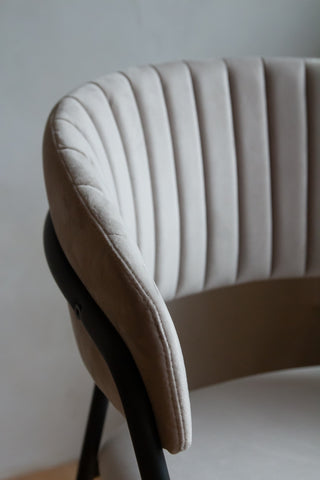 Side angle close-up image of the Curved Back Velvet Bar Stool In Mink Grey