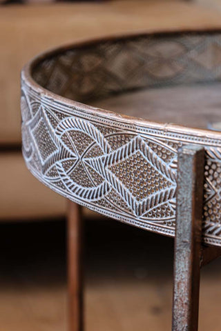 Close-up image of the detail on the Detailed Bronze Tray Round Side Table