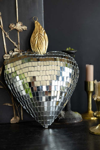 Lifestyle image of the Disco Ball Mirrored Heart Ornament